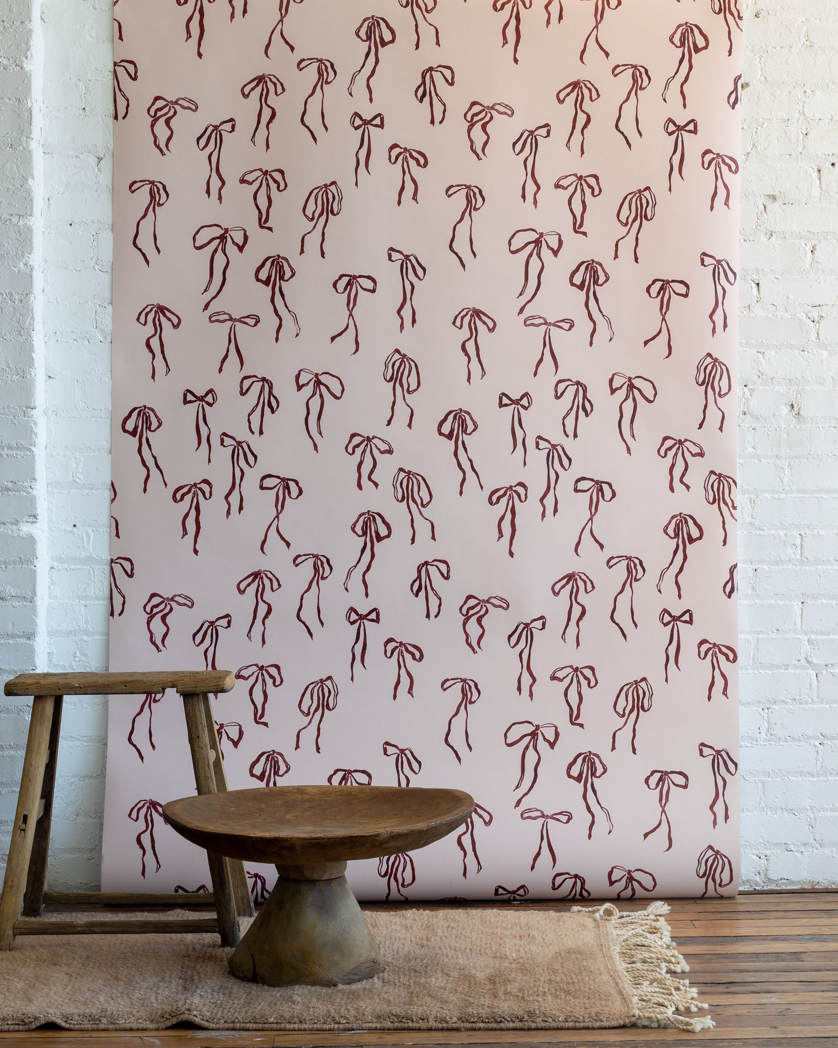 Bows wallpaper in Cran - modern matte paper finish with hand-painted watercolor bows for feature walls