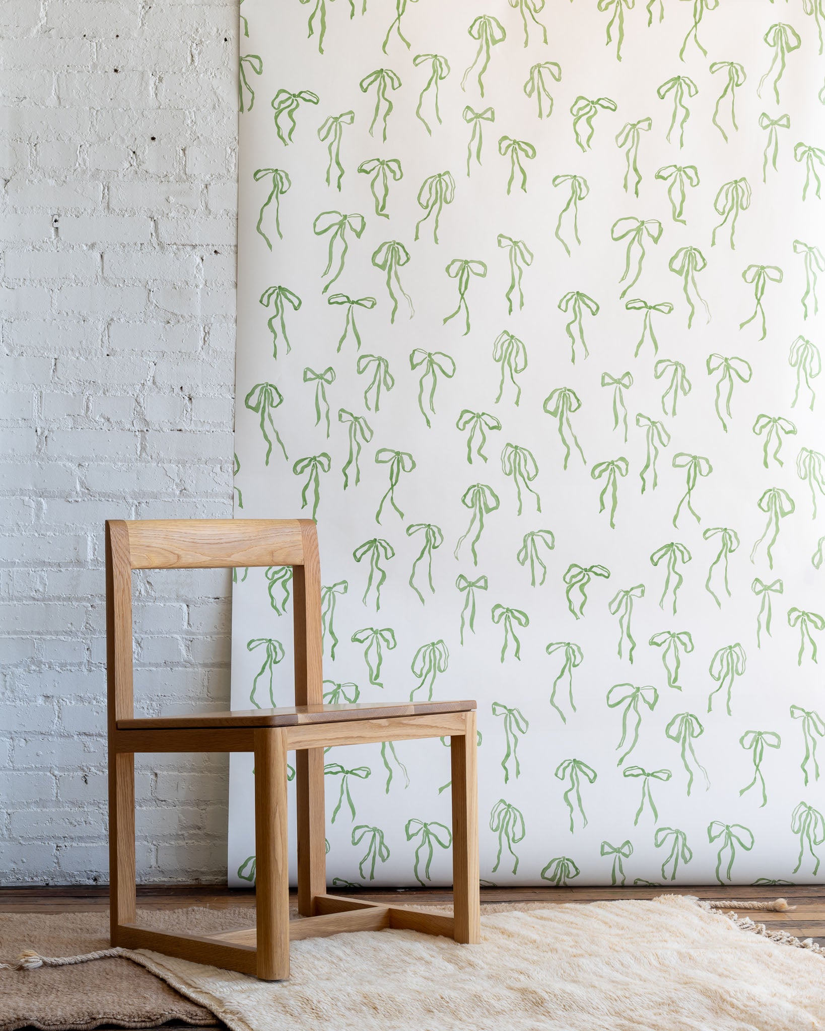 Green Tea colorway of Bows wallpaper on matte paper - hand-painted for bright residential spaces