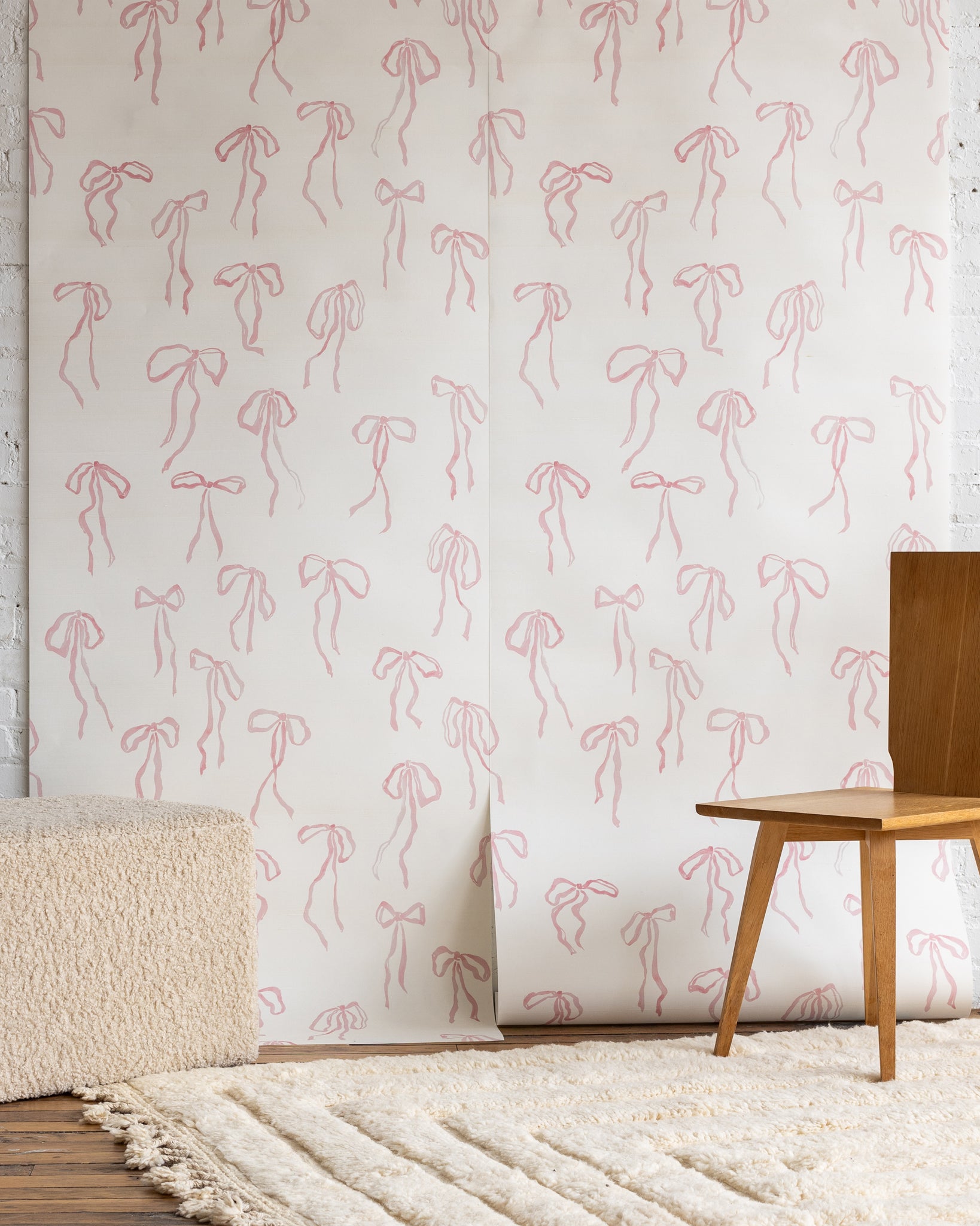 Whimsical bow pattern in Pink Quartz, silk wallpaper - adds warmth to modern interiors