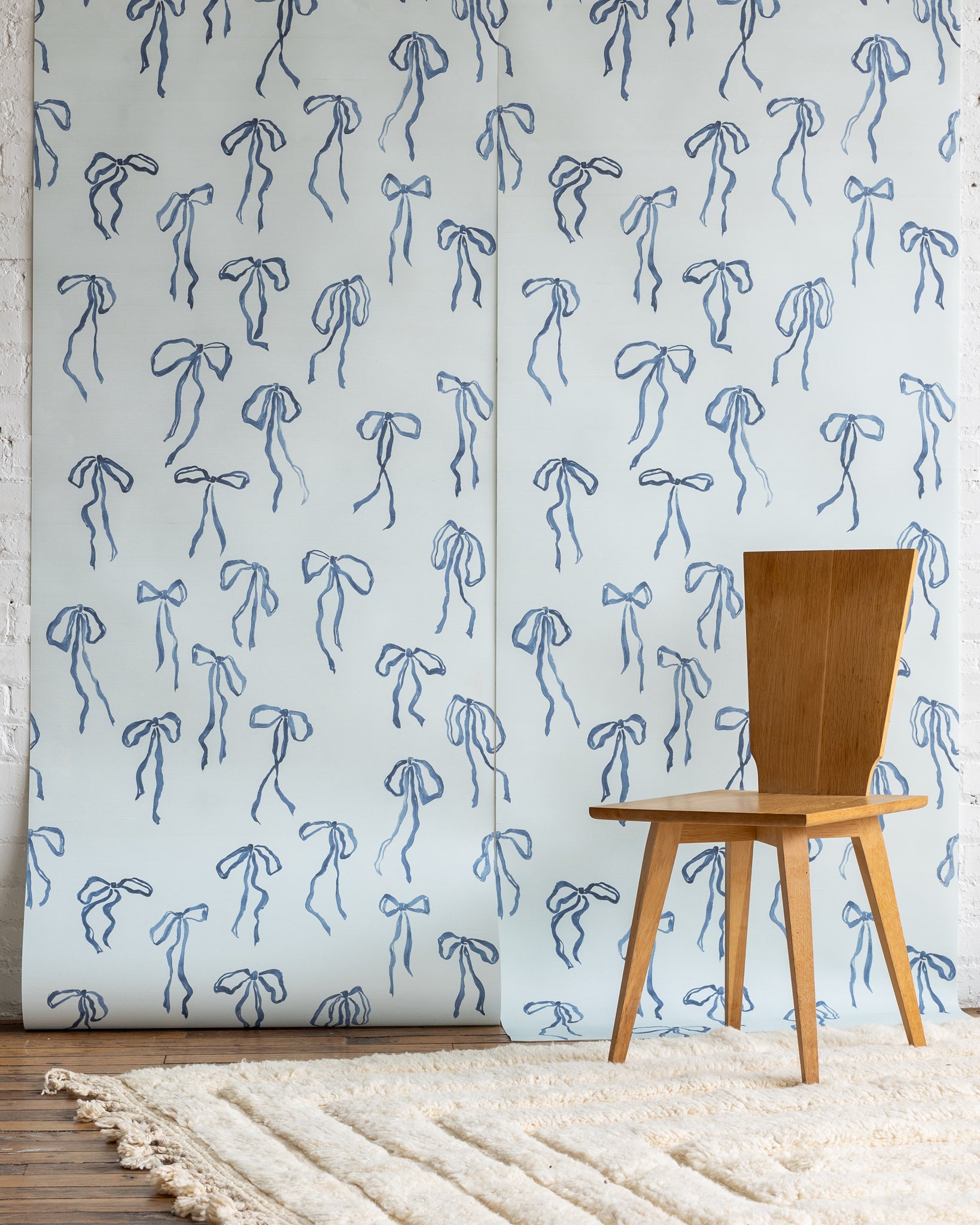 Bows silk wallpaper in Powder Blue - light and airy watercolor bow pattern for serene interiors