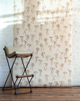 Hand-painted bow pattern in Walnut brown wallpaper for walls - contemporary wallpaper for timeless, natural spaces