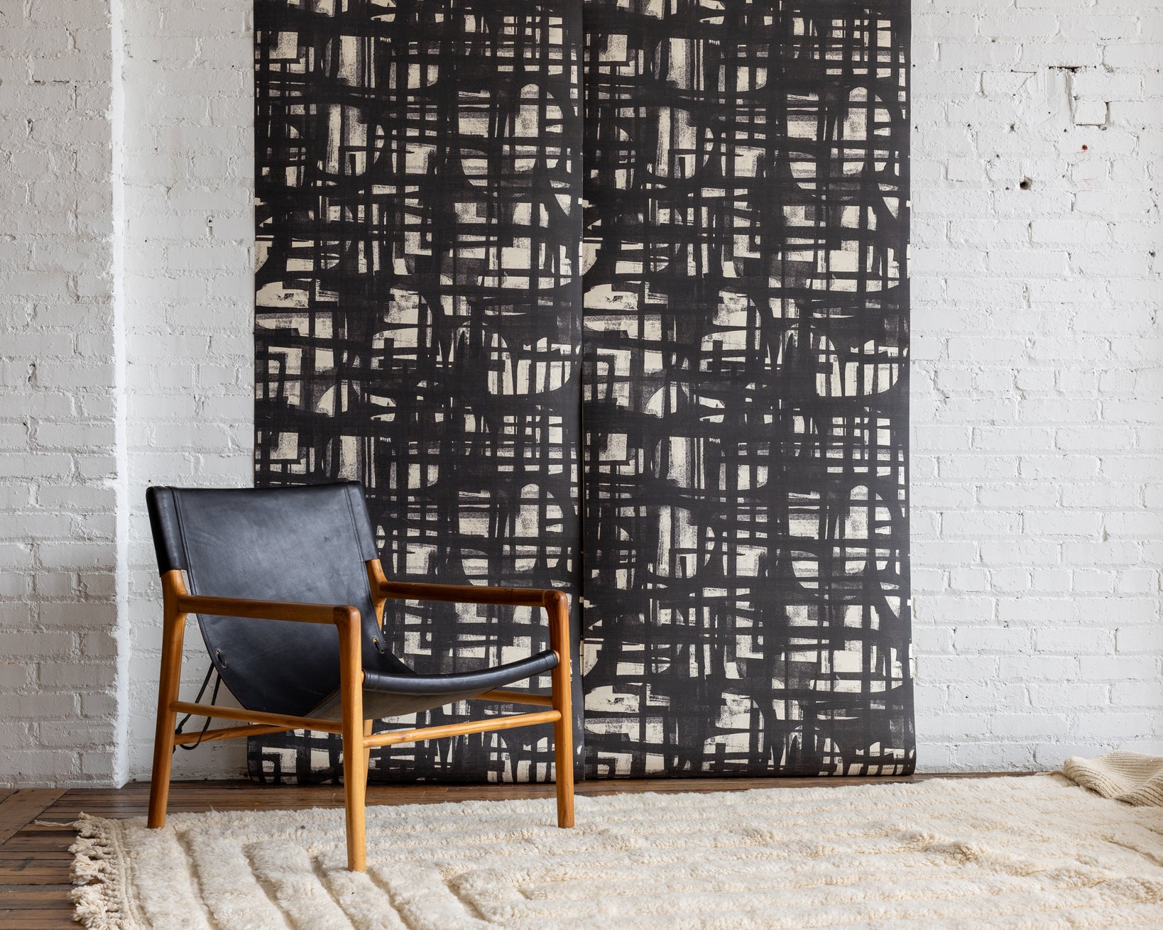 Monoprint Charcoal Grasscloth Wallpaper - Bold Dark Geometric Grasscloth Wallpaper for Dramatic Accent Walls, Styled with a Vintage Lounge Chair